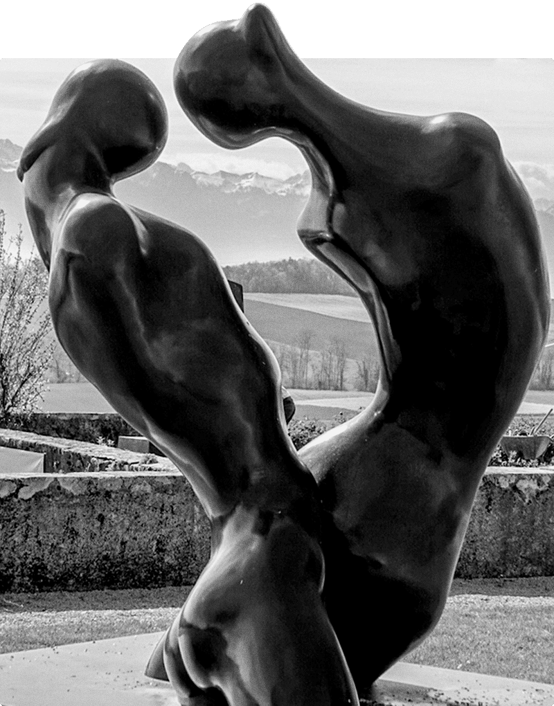 Work by Manuel Carbonell depicting two people embracing, a delicate dance.