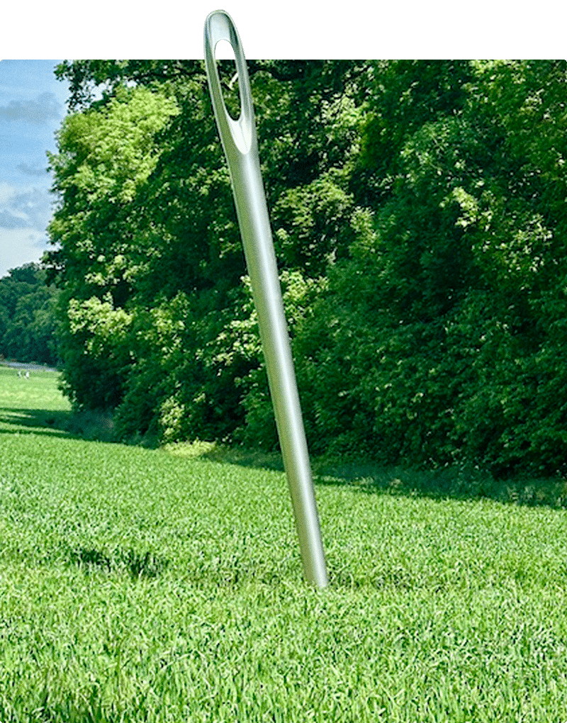 Nicole Dufour's giant needle in a field at Château de Vullierens